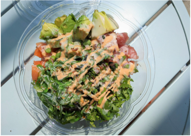 Poke Bowl: brown rice, organic salmon, organic tuna, avocado, cilantro, edamame, cilantro, furikake, seaweed salad